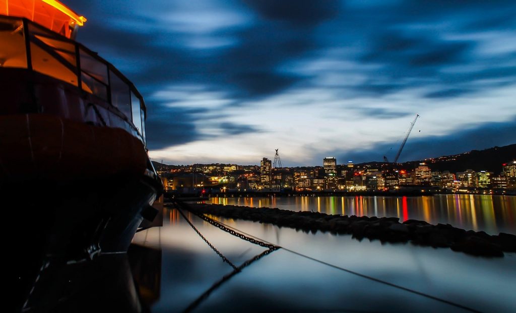 Boat on the water city view